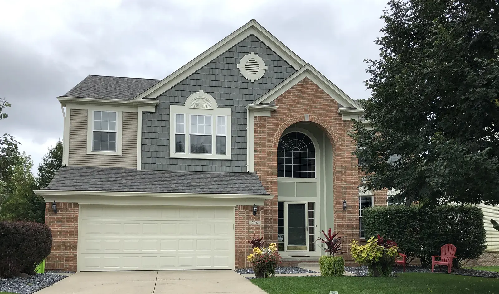 Exterior painting project at 796 Hidden Creek Dr, South Lyon — Morning Mist - Benjamin Moore