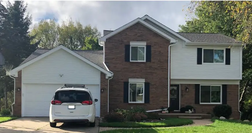 Exterior painting project at 1007 Ridgeview Circle, Orion Township — White Wisp - Benjamin Moore Vinyl Safe