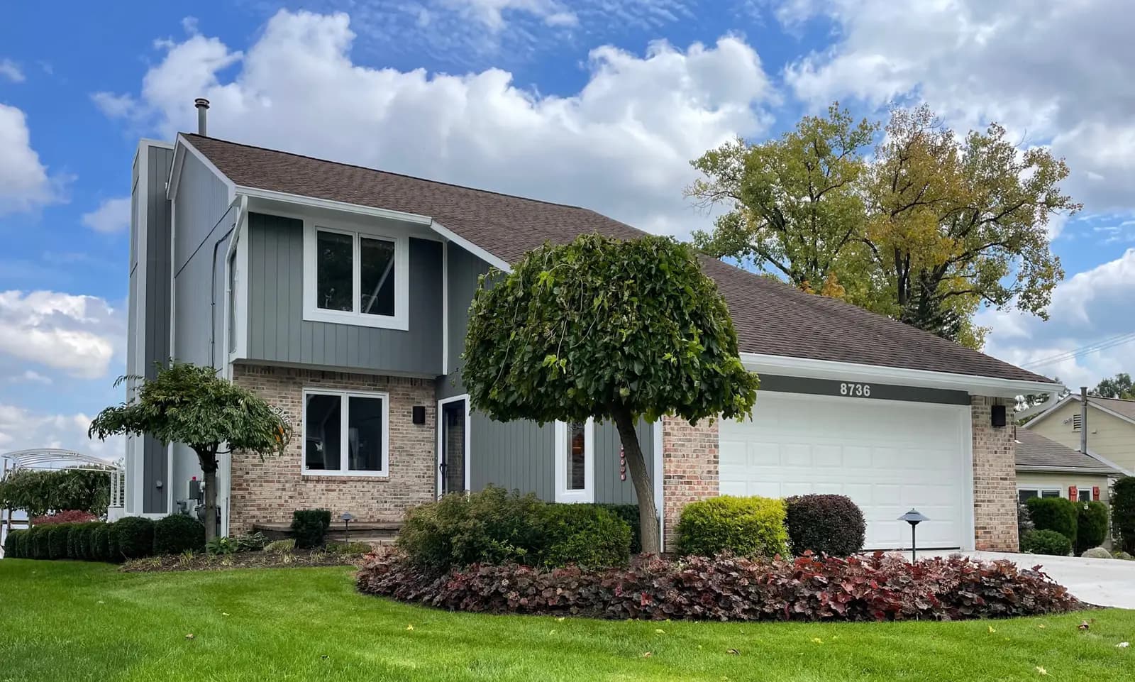 Exterior painting project at 8736 Arlington Street, White Lake — Amherst Gray - Benjamin Moore