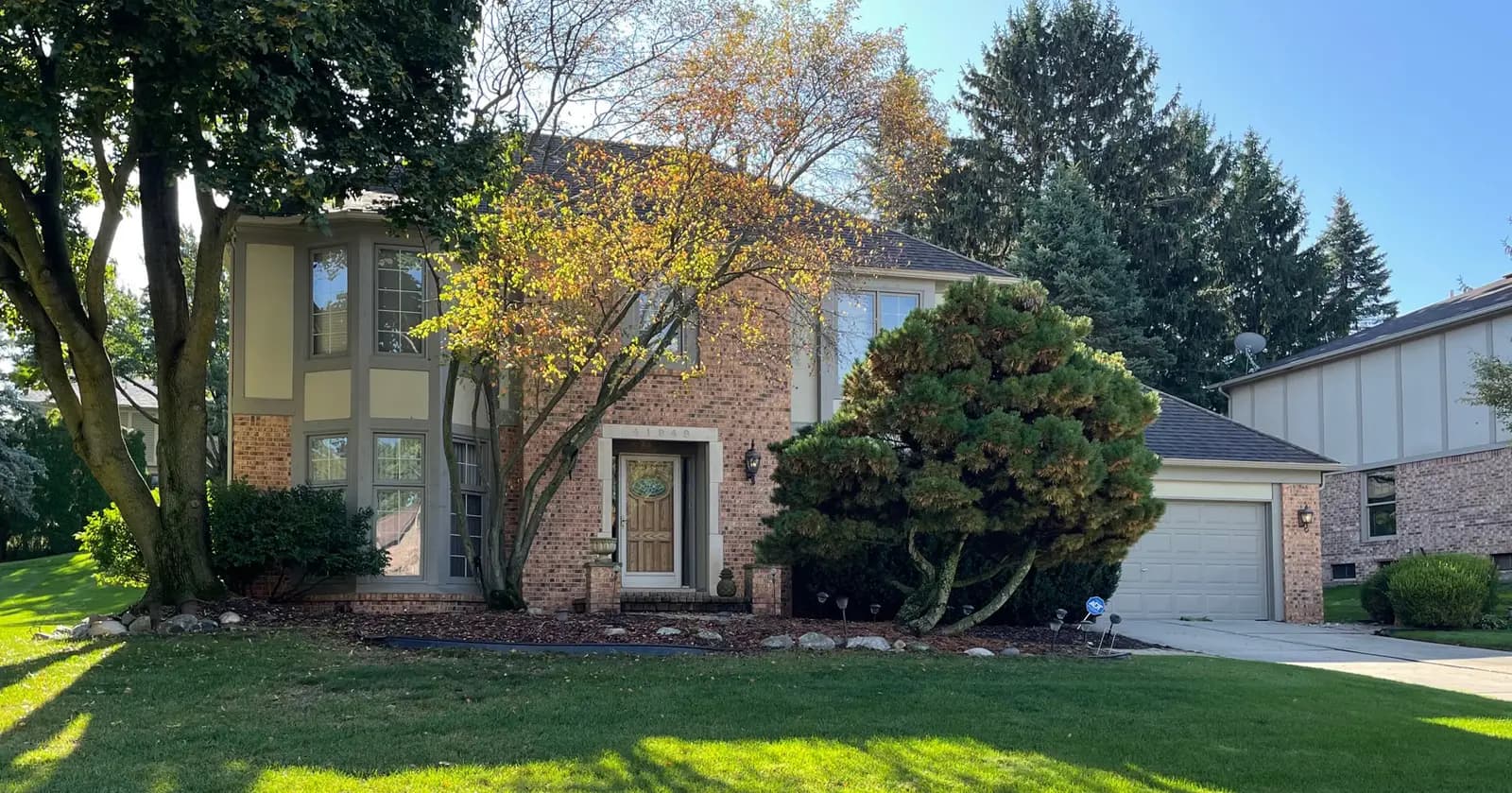 Exterior painting project at 41949 Waterwheel Road, Northville — Embassy Green - Benjamin Moore