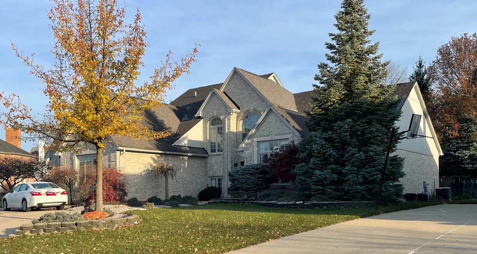 Exterior painting project at 2433 Hornbeam Drive, Sterling Heights — Gray Huskie - Benjamin Moore
