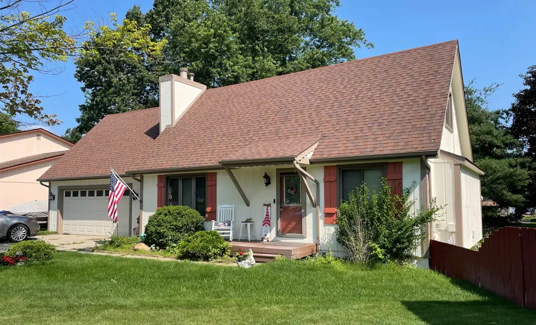 Exterior painting project at 3802 Thomas Court, Commerce Township — Navajo White - Benjamin Moore