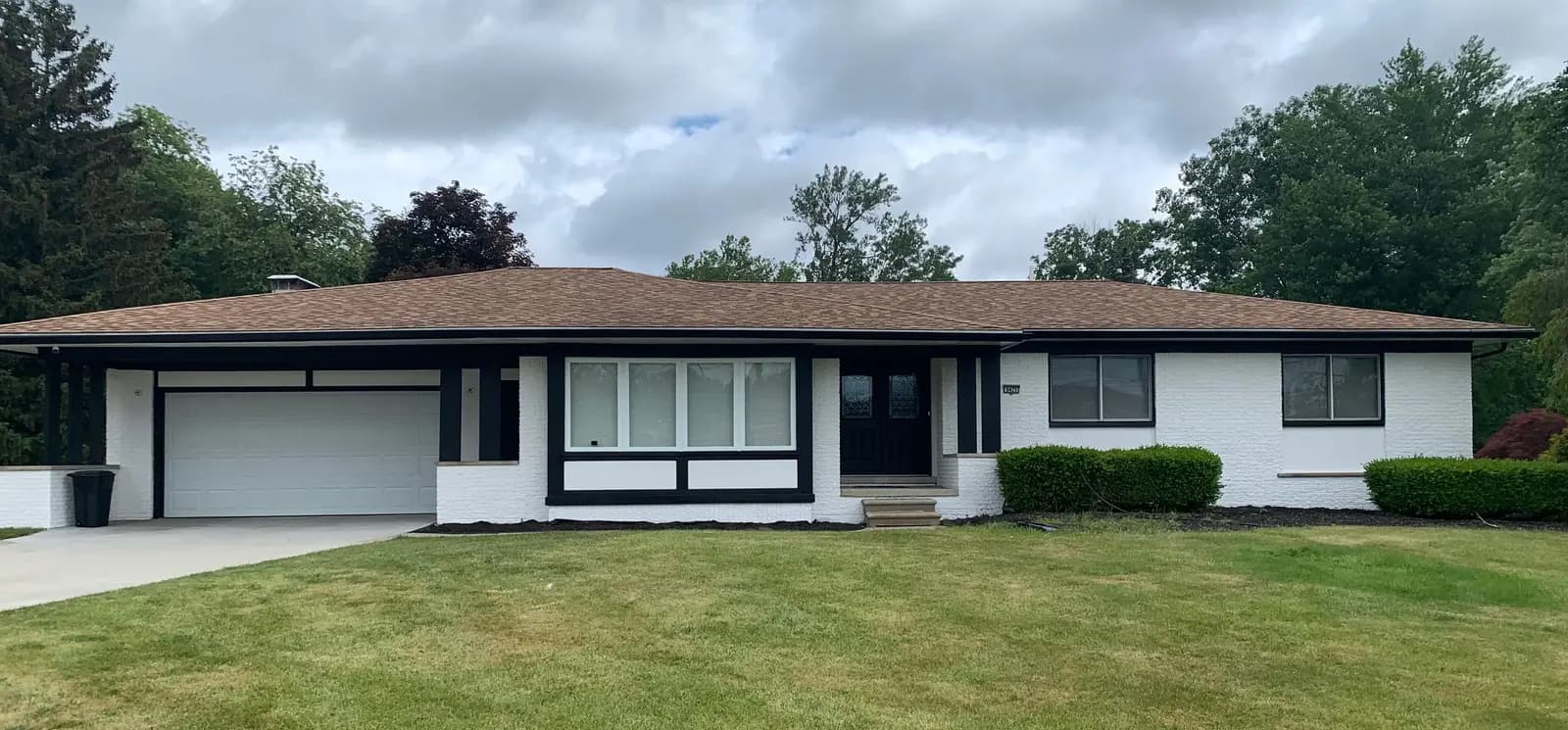 Exterior painting project at 6425 Wellesley Drive, West Bloomfield — Jet Black - Benjamin Moore