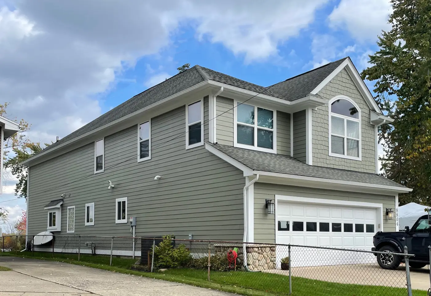 Exterior painting project at 8804 Arlington Street, White Lake — Connected Gray - Sherwin Williams