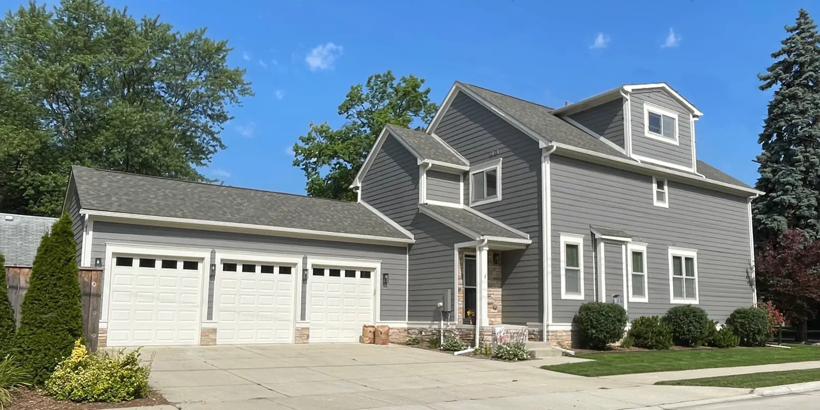 Exterior painting project at 420 Baldwin Avenue, Royal Oak — Gauntlet Gray - Sherwin Williams