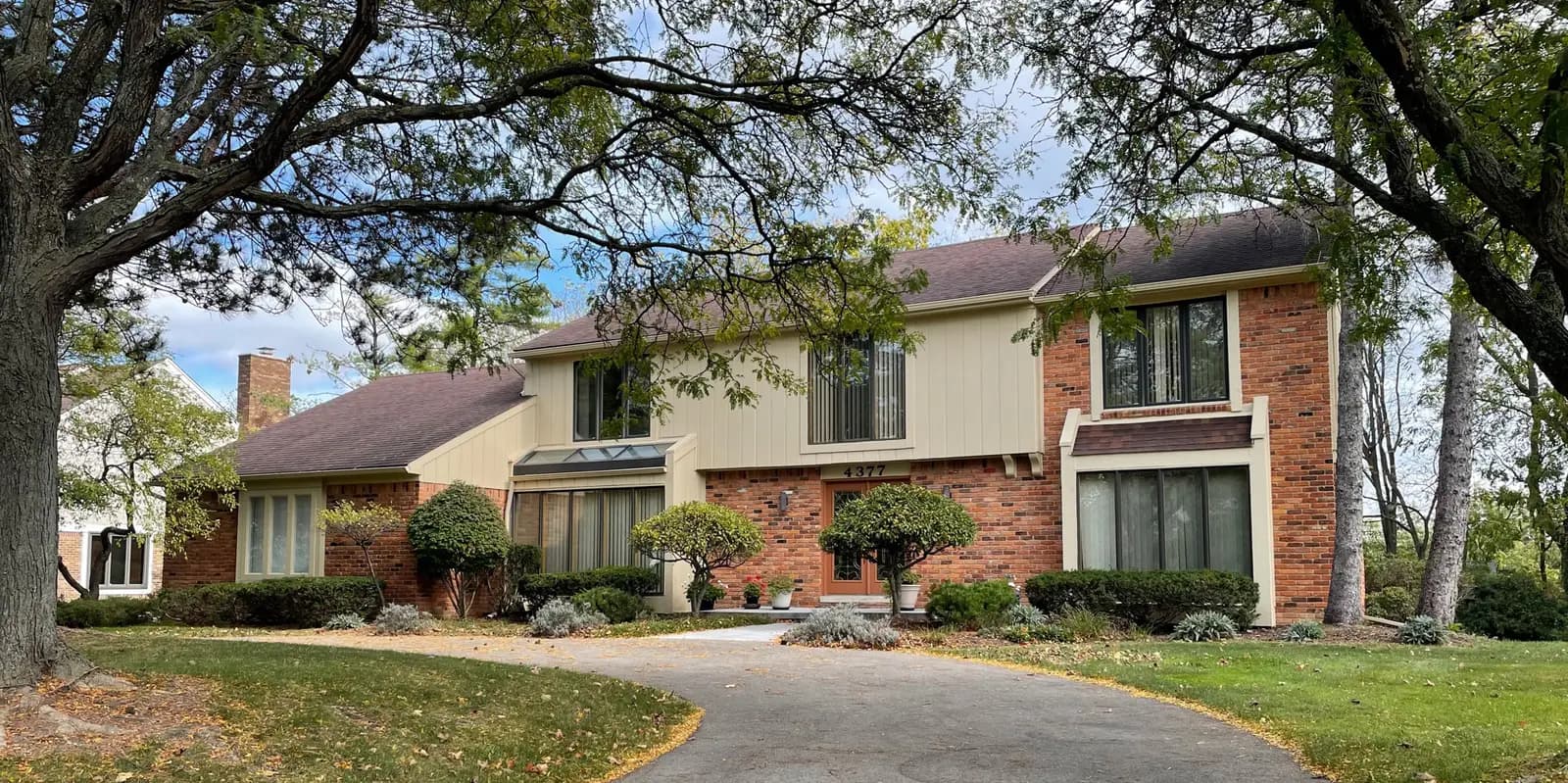 Exterior painting project at 4377 Strathdale Court, West Bloomfield — Stone House - Benjamin Moore