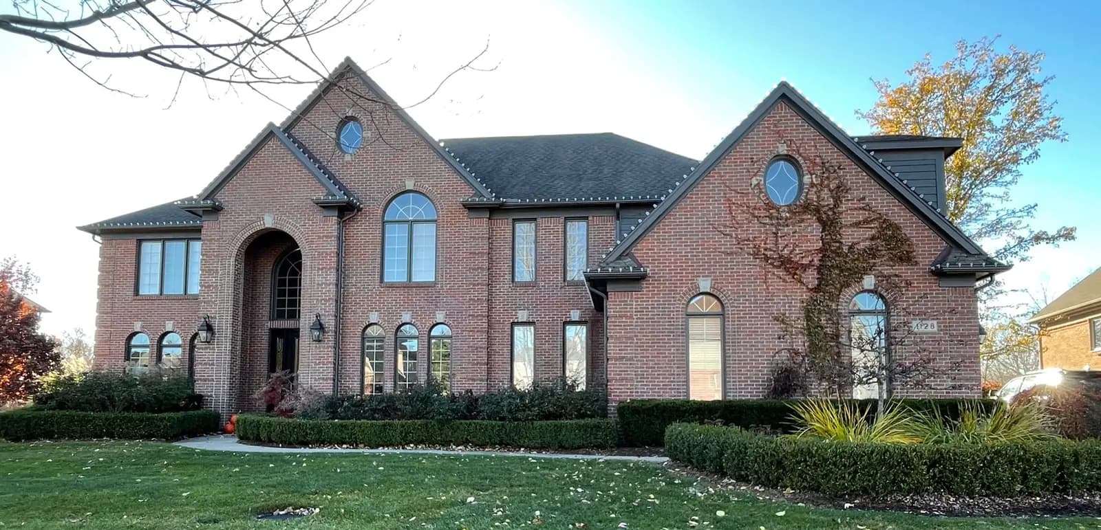 Exterior painting project at 1128 Autumnview Drive, Rochester — Urbane Bronze - Sherwin Williams