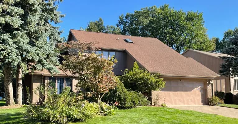 Exterior painting project at 2551 Browning Drive, Orion Township — Taupetone - Benjamin Moore