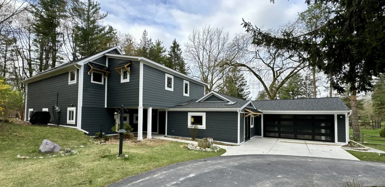 Exterior painting project at 60310 Eyster Road, Rochester — Custom Color VS