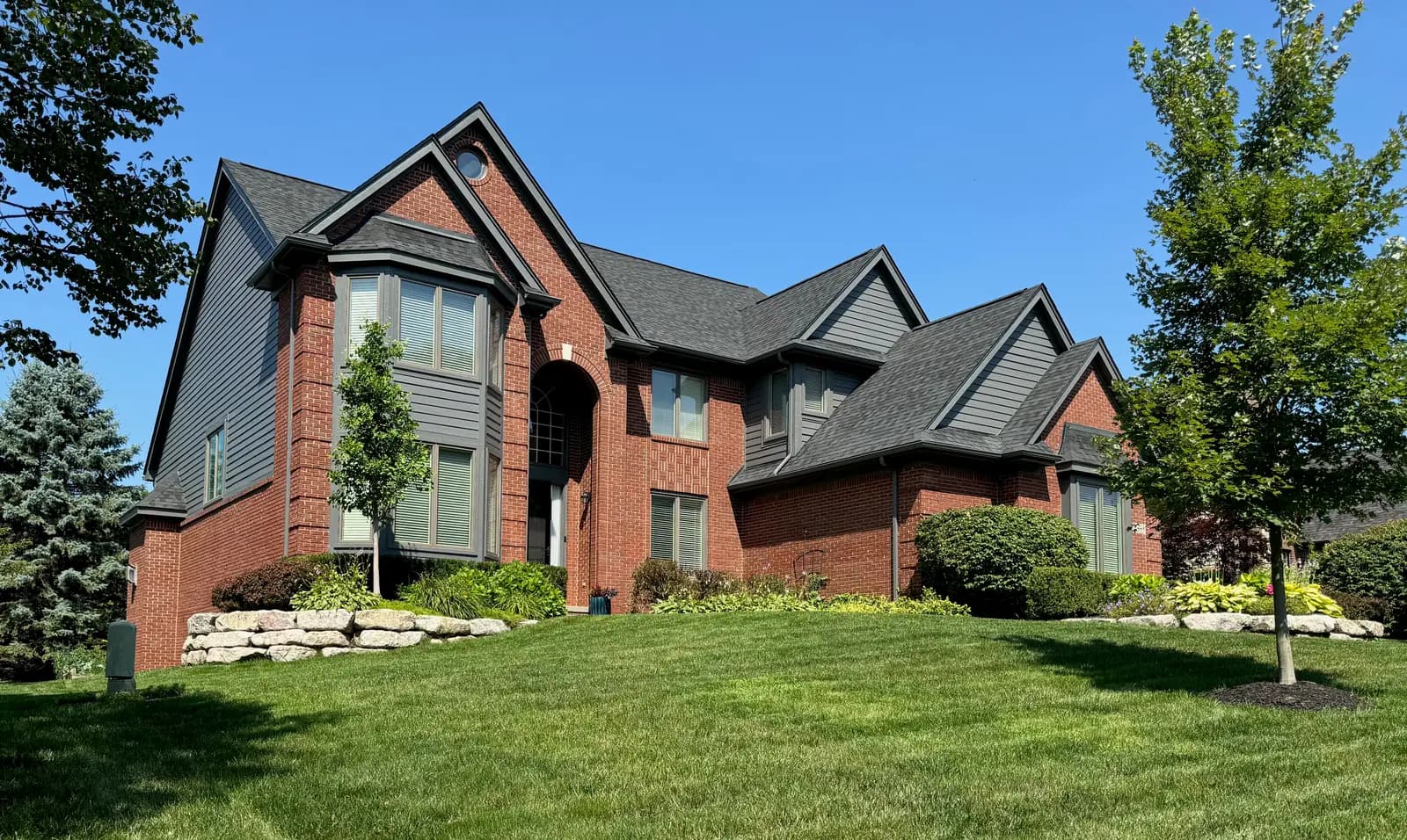 Exterior painting project at 4393 Darlene Drive, Commerce Township — Kendall Charcoal - Benjamin Moore
