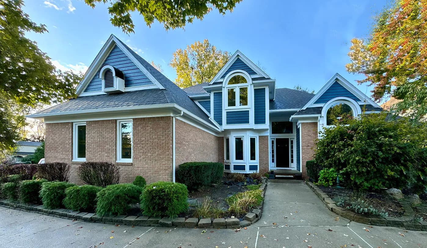 Exterior painting project at 54098 Birchfield Drive East, Shelby Township — Sea Serpent - Sherwin Williams