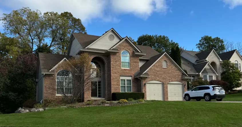 Exterior painting project at 28373 Golf Pointe Blvd, Farmington Hills — Stone Lion - Sherwin Williams