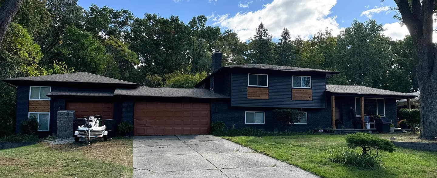 Exterior painting project at 52548 Thornebrook Drive, Shelby Township — Iron Ore - Sherwin Williams Vinyl Safe