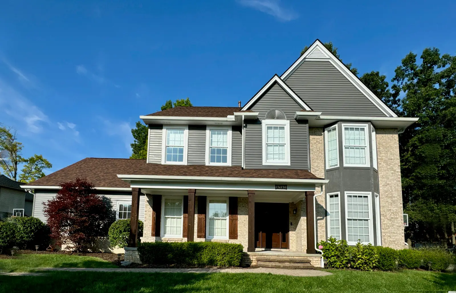 Exterior painting project at 4941 Knollcrest Court, Commerce Township — Pepper Shaker - Sherwin Williams Vinyl Safe