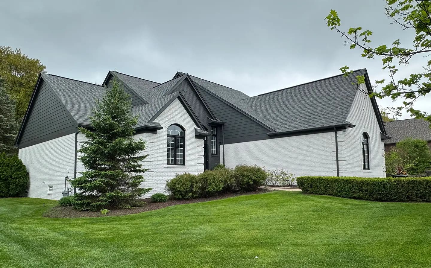 Exterior painting project at 750 Roxbury Court, Orion Township — Iron Ore - Sherwin Williams