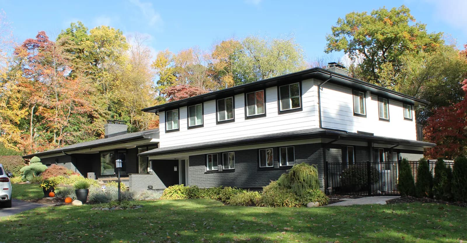 Exterior painting project at 2310 Charnwood Dr, Troy — Extra White - Sherwin Williams