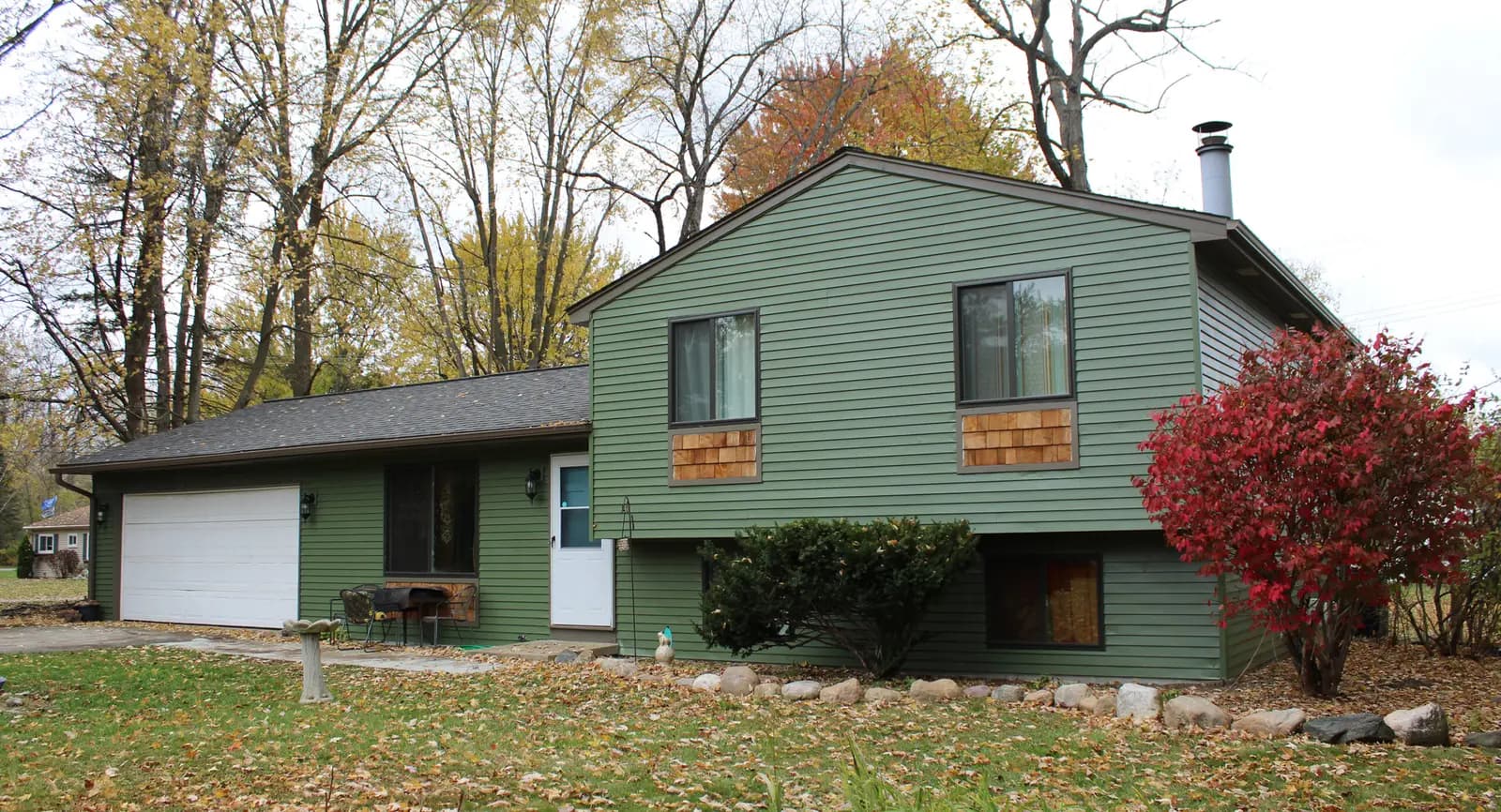Exterior painting project at 720 Casemer Rd, Orion Township — Oakmoss - Sherwin Williams