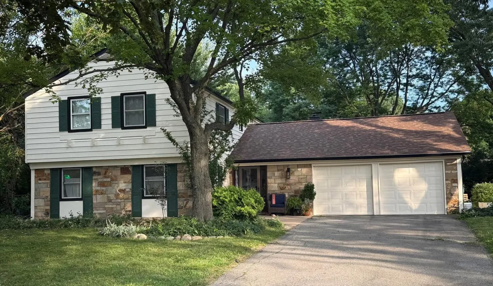 Exterior painting project at 2696 Kenwyck Drive, Troy — Evening White - Benjamin Moore