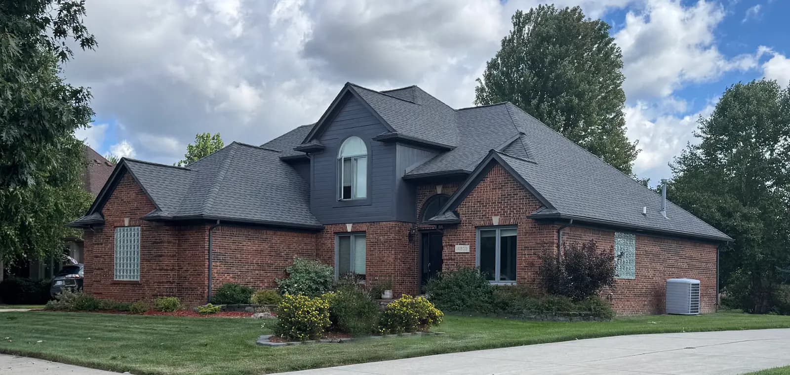 Exterior painting project at 14809 Sparrow Drive, Shelby Township — Gray - Benjamin Moore