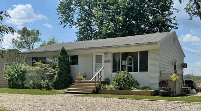 Exterior painting project at 4014 Joslyn Rd, Orion Township — Gray Owl - Benjamin Moore