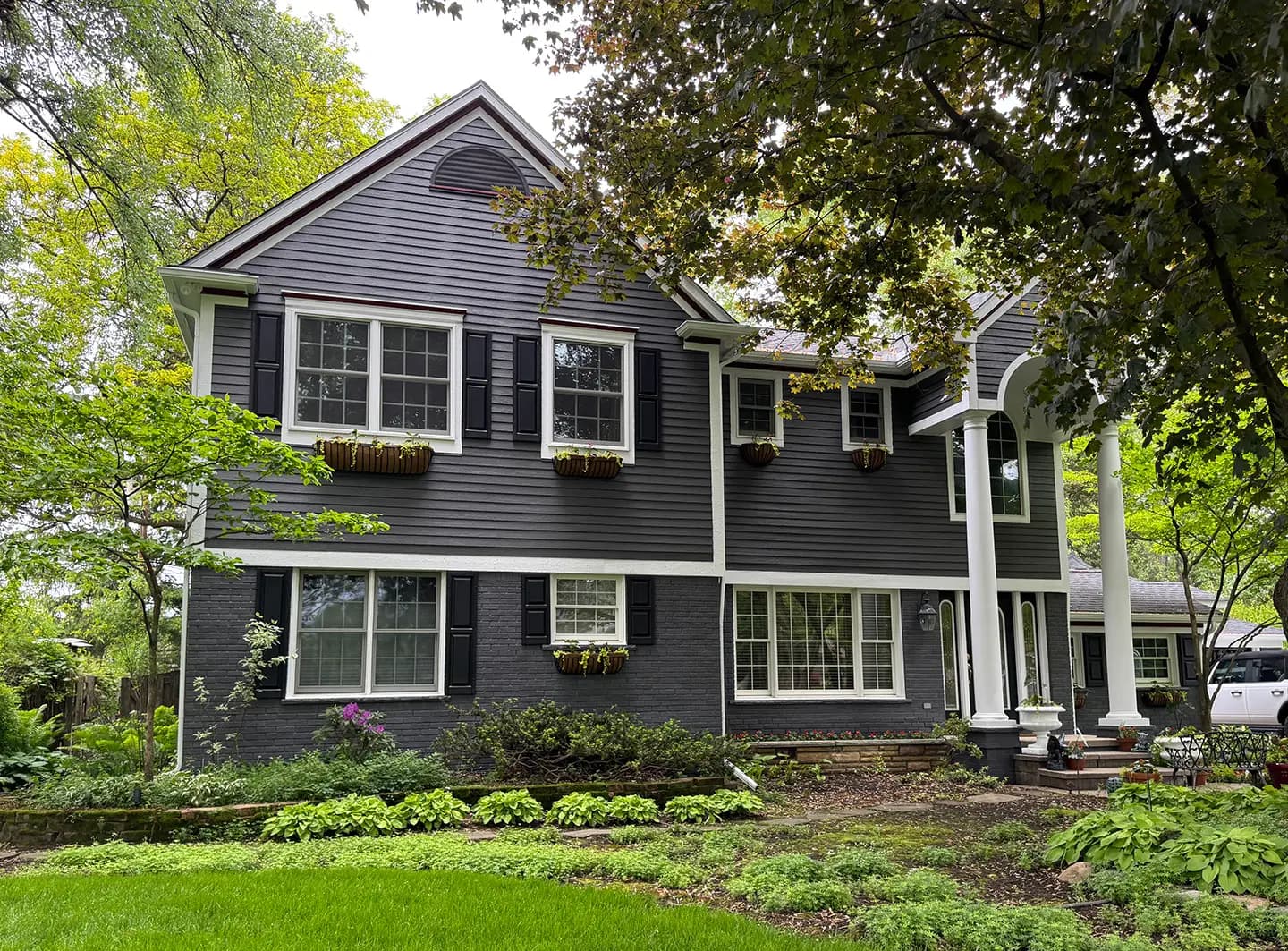 Exterior painting project at 1311 Glaser Drive, Troy — Gray - Benjamin Moore