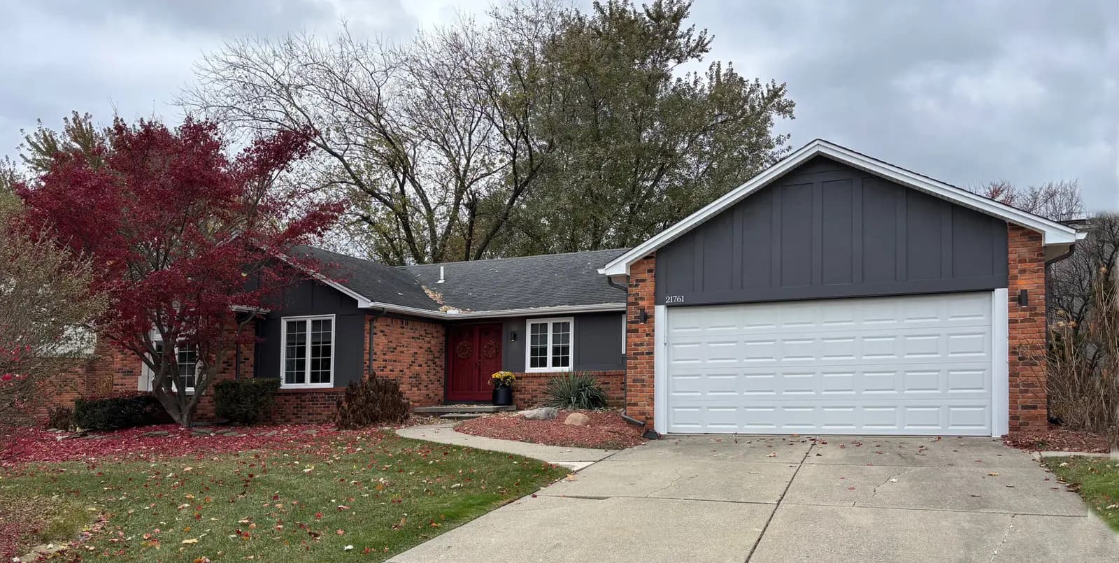 Exterior painting project at 21761 Glenwild Drive, Northville — Peppercorn - Sherwin Williams Vinyl Safe