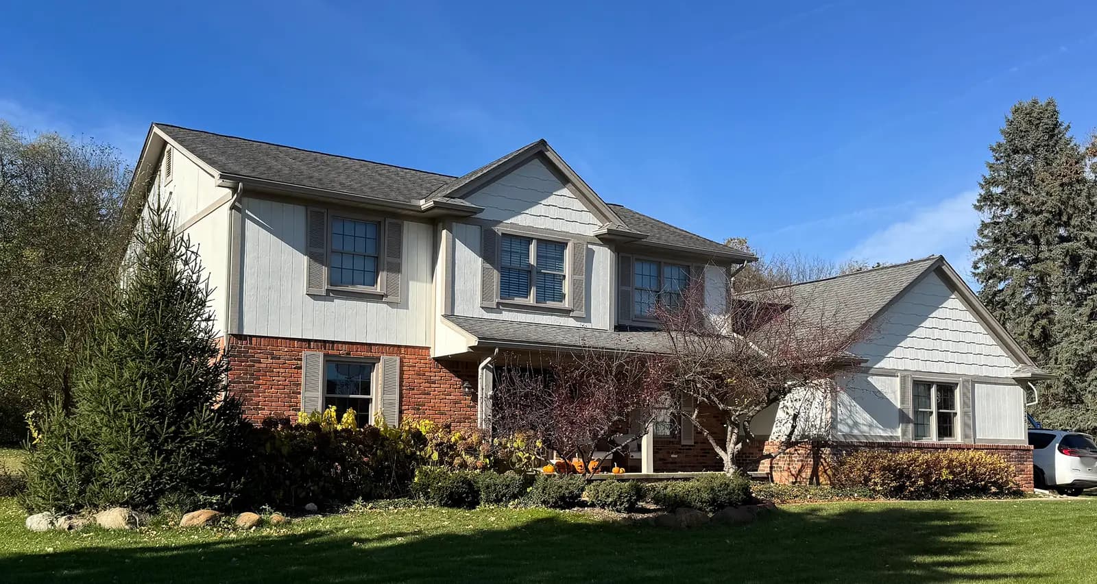 Exterior painting project at 5249 Sun Valley Court, Clarkston — Swiss Coffee - Benjamin Moore