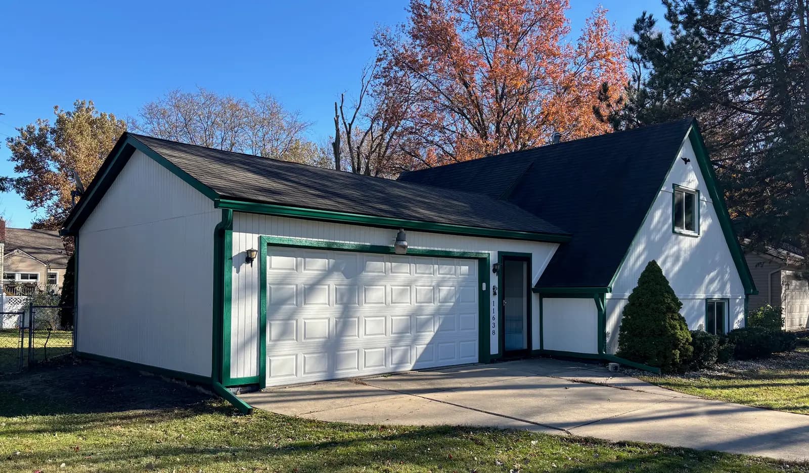 Exterior painting project at 11638 Alois Street, Livonia — Vanilla Milkshake - Benjamin Moore