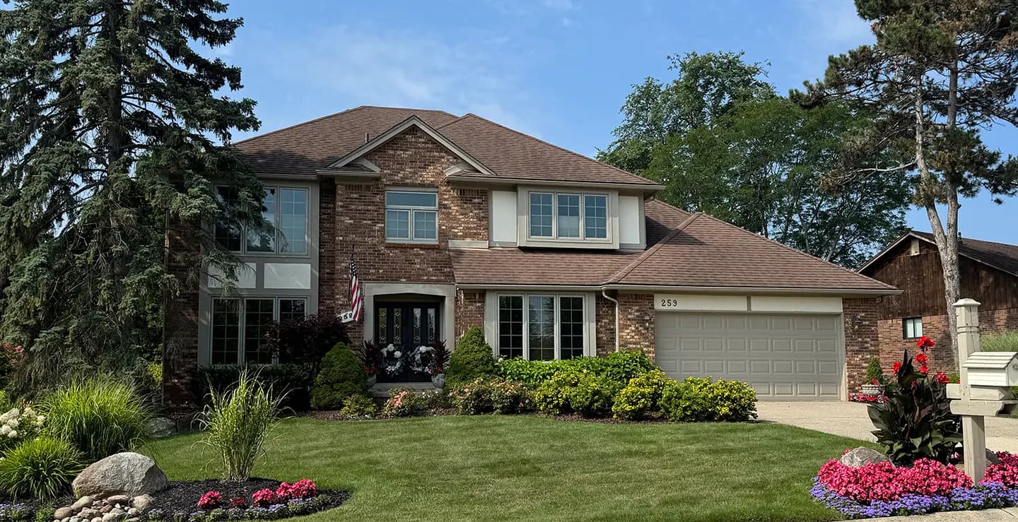 Exterior painting project at 259 Stonetree Circle, Rochester Hills — Navajo White - Benjamin Moore