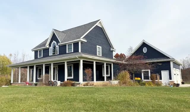 Exterior painting project at 48445 West 10 Mile Road, Novi — Kendall Charcoal - Benjamin Moore