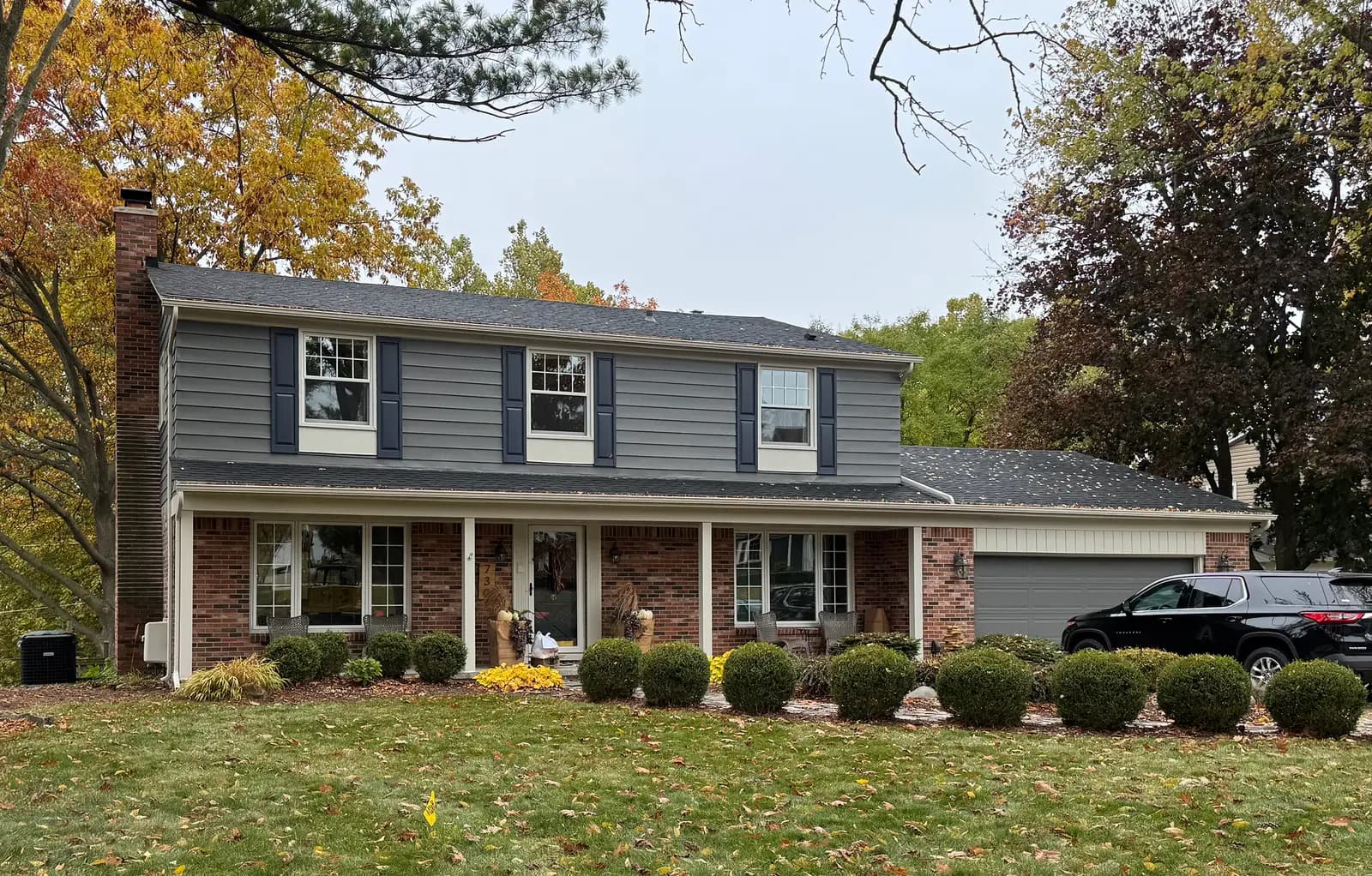 Exterior painting project at 730 Campus Road, Rochester Hills — Kendall Charcoal - Benjamin Moore