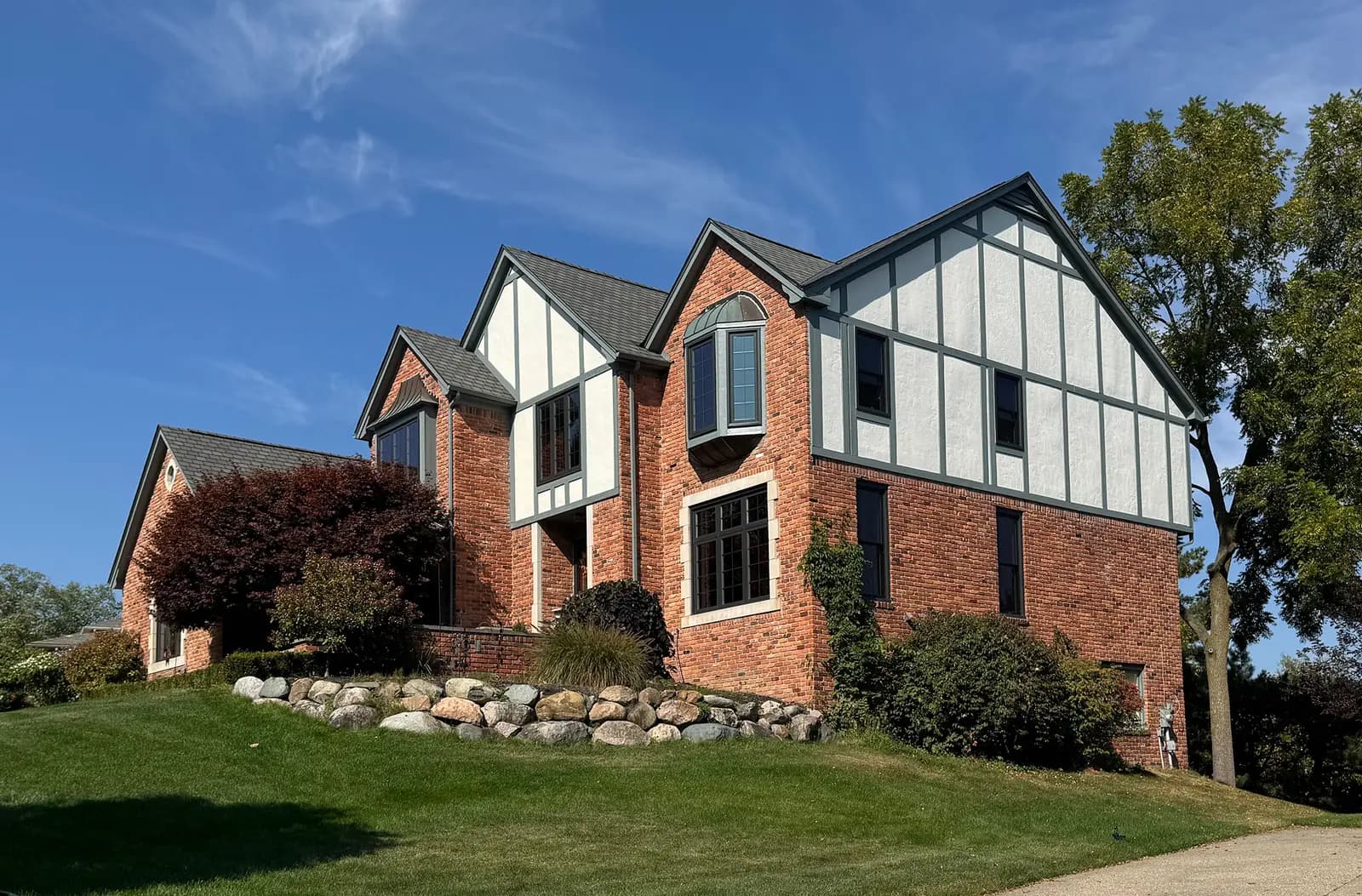 Exterior painting project at 3090 Kenwood Drive, Rochester Hills — Night Train- Benjamin Moore