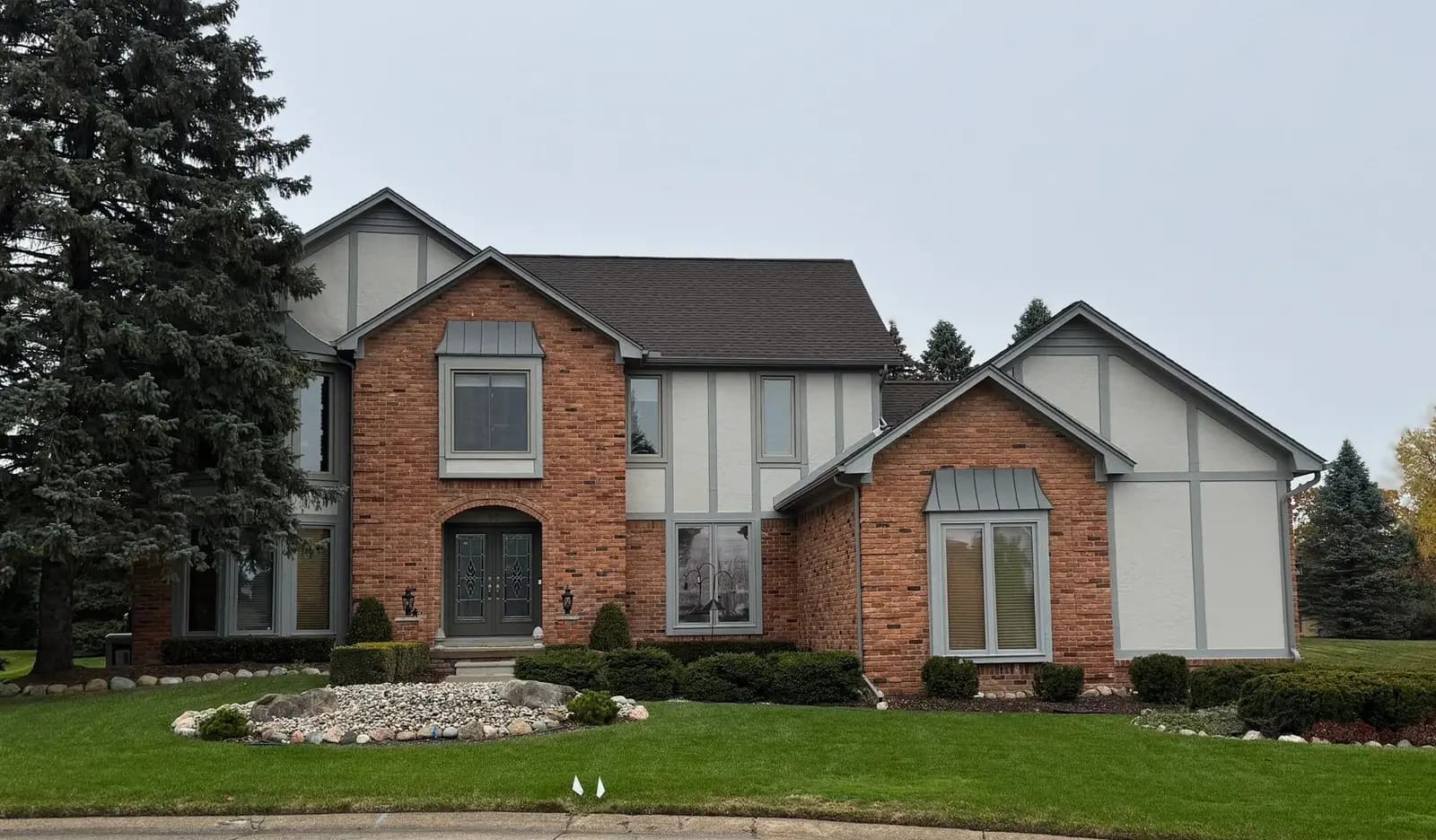Exterior painting project at 82 Vistaview Court, Rochester Hills — Revere Pewter - Benjamin Moore